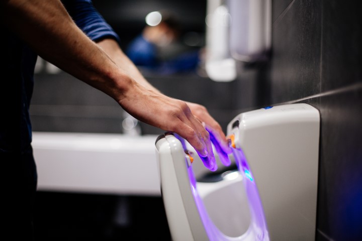 photo of hand dryer with sterilization light